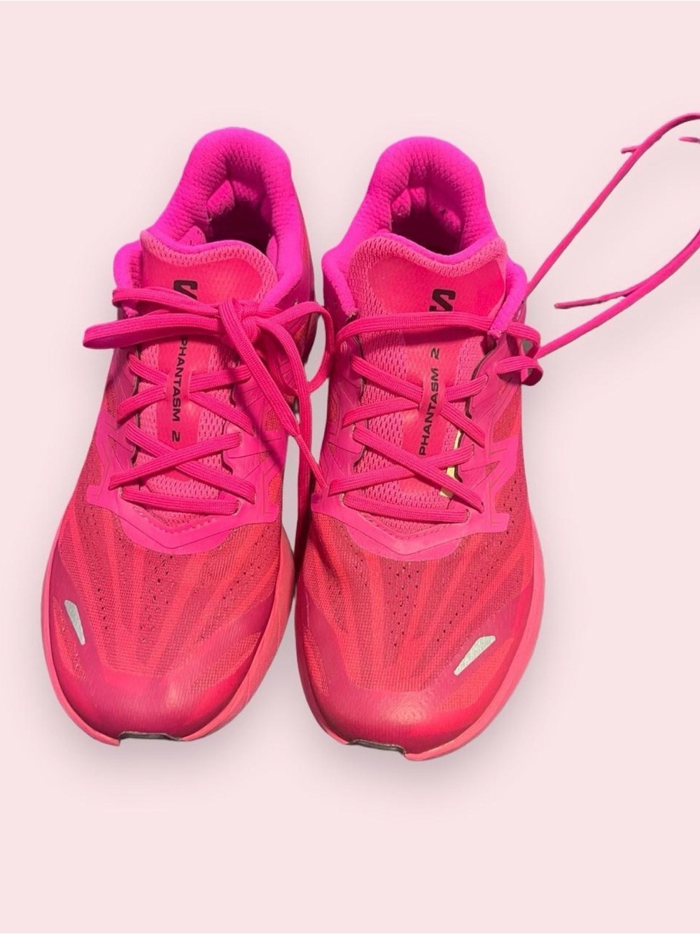 Salomon pink running shoes